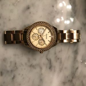 Gold fossil watch